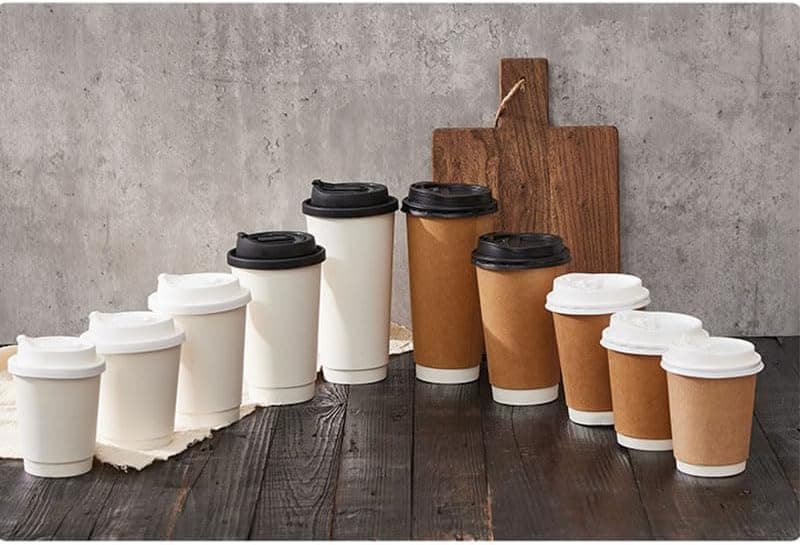 Custom branded coffee cups collection — multiple sizes with logo printing